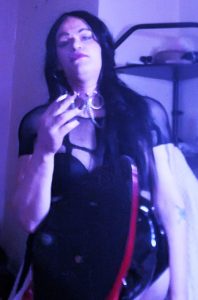Hot smoking shemale mistress TS KittyKat makes you kneel and obey at her feet while she blows her cigarette smoke in your face